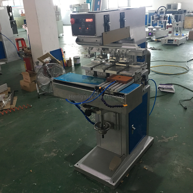 四色穿梭油盅移印机